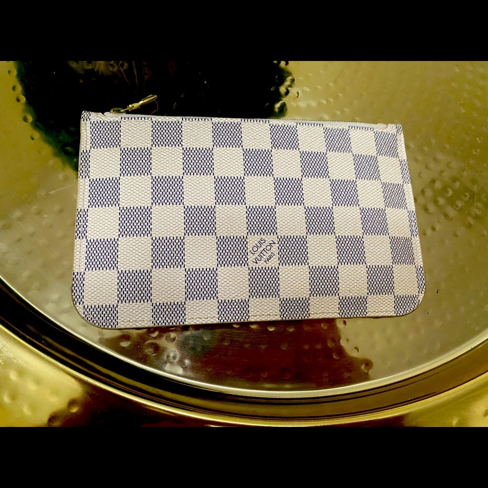 Authentic Louie Vuitton.